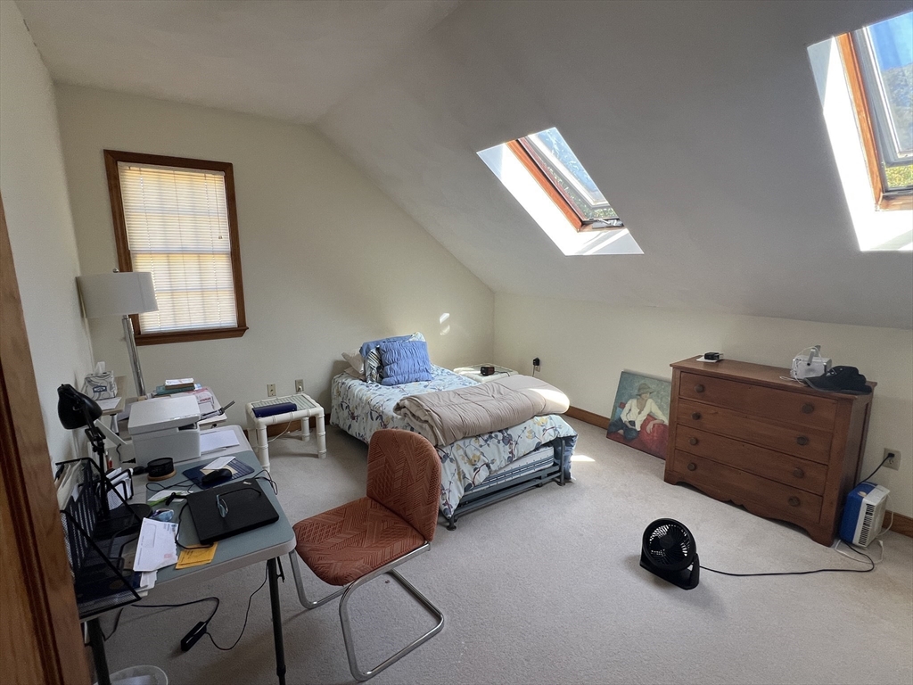 1050 Chestnut Street, Unit 1050 Newton, MA 02464 - Photo 11 of 15 a bedroom with furniture and a window