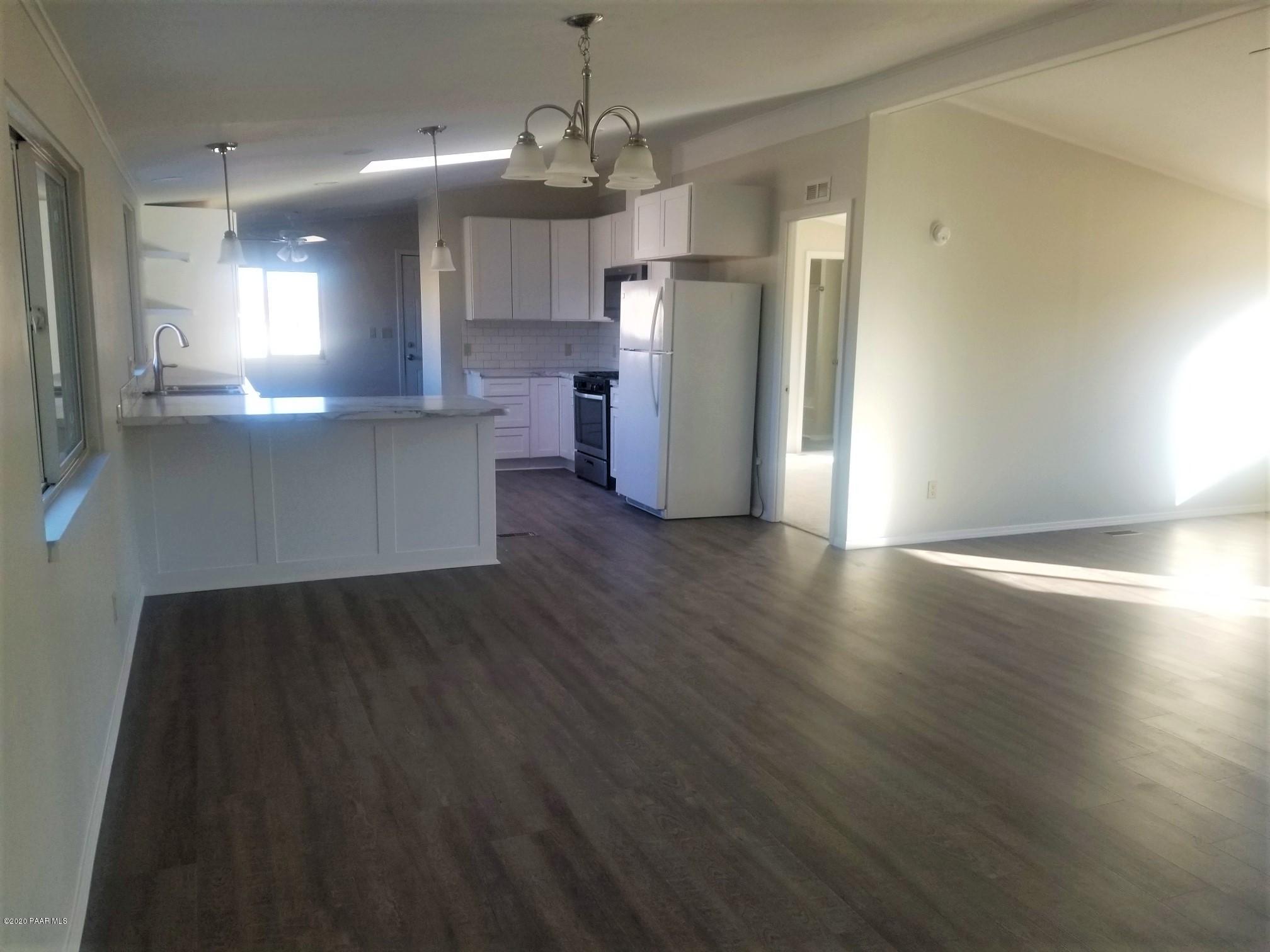 3361 North Reed Road Chino Valley, AZ 86323 - Photo 15 of 29 a view of kitchen with refrigerator and window