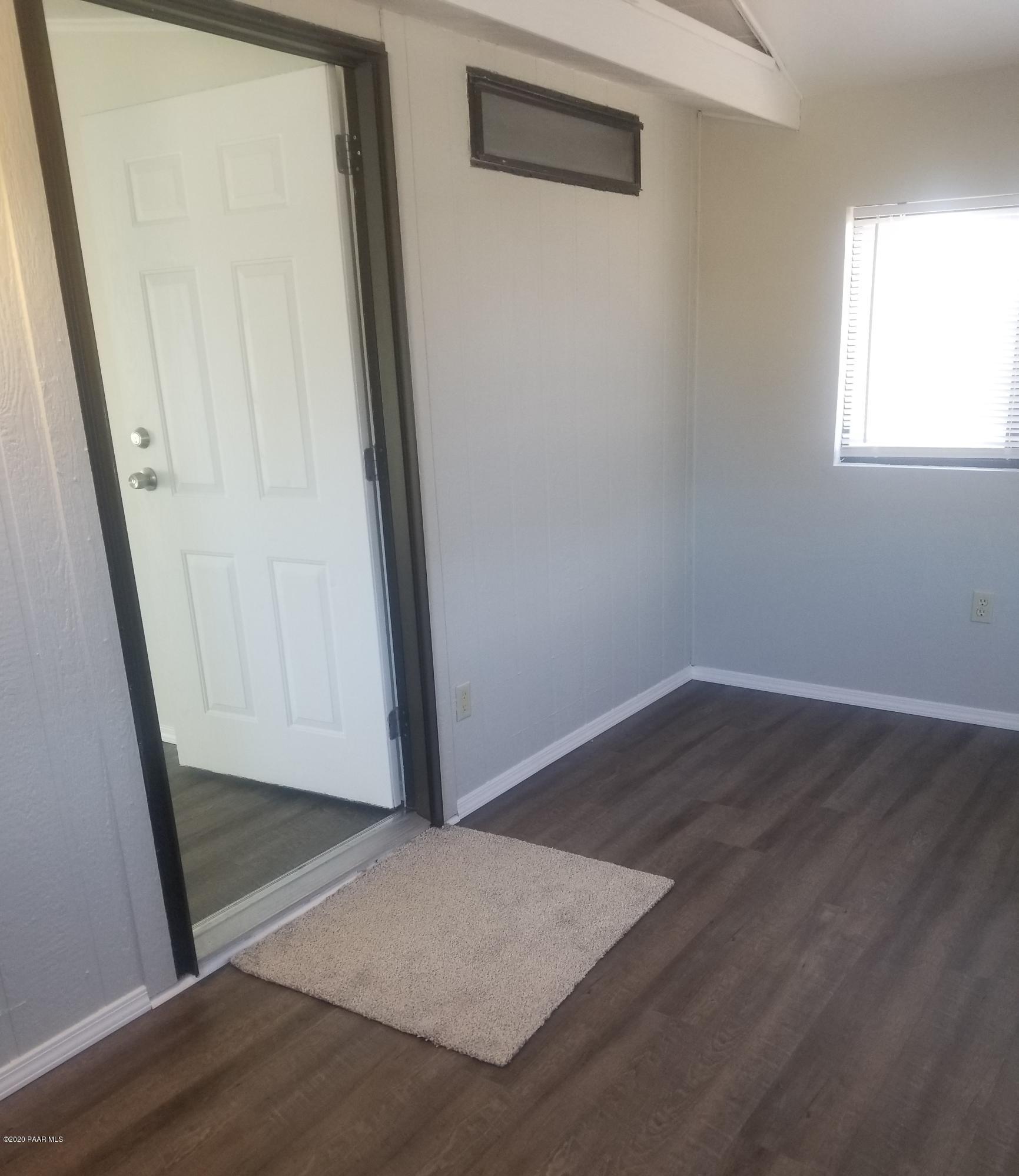 3361 North Reed Road Chino Valley, AZ 86323 - Photo 7 of 29 a view of front door with wooden floor