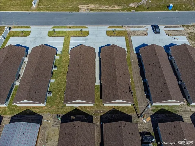 an aerial view of a pool patio swimming pool and outdoor space