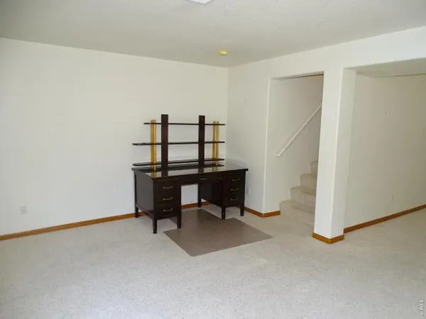 a view of a room with table and chair