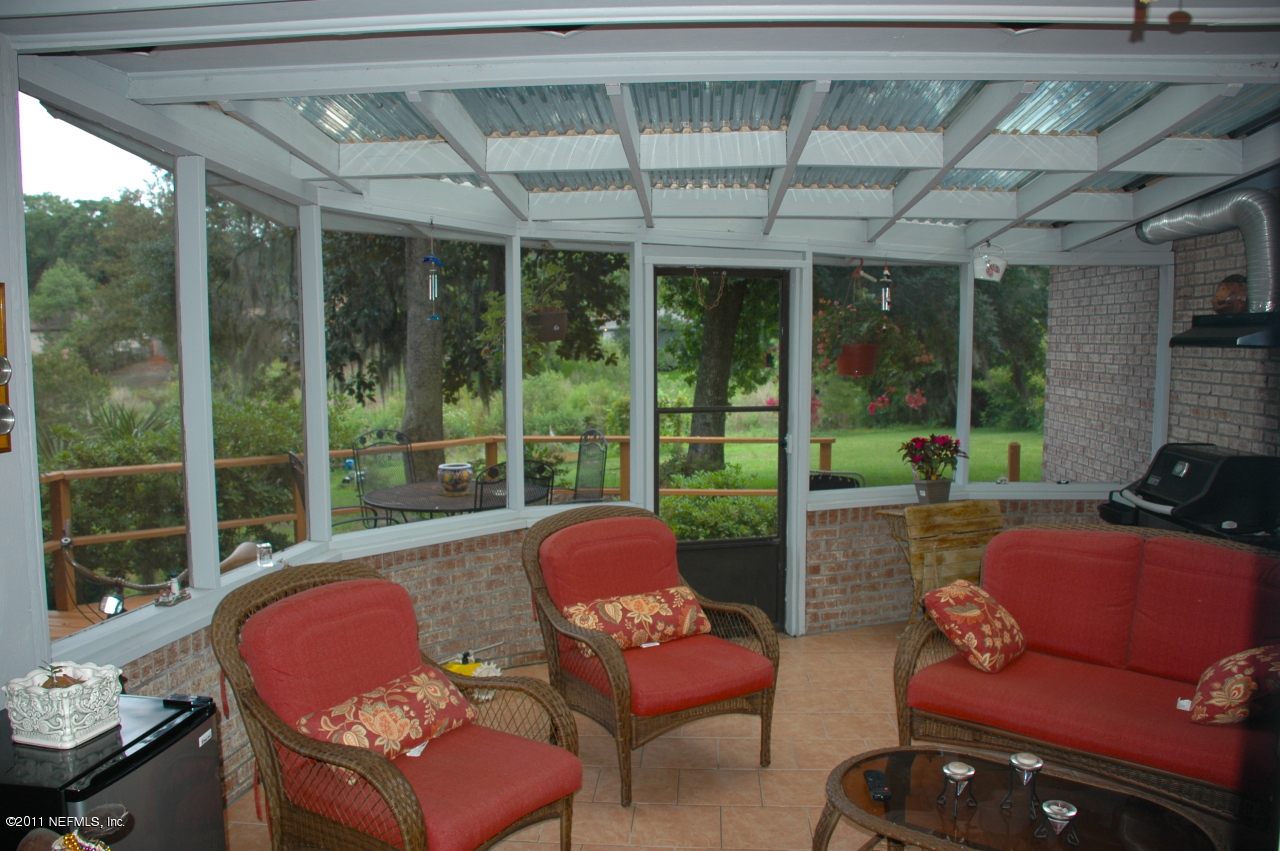 3494 Sandburg Road Jacksonville, FL 32277 - Photo 7 of 13 Screened Patio