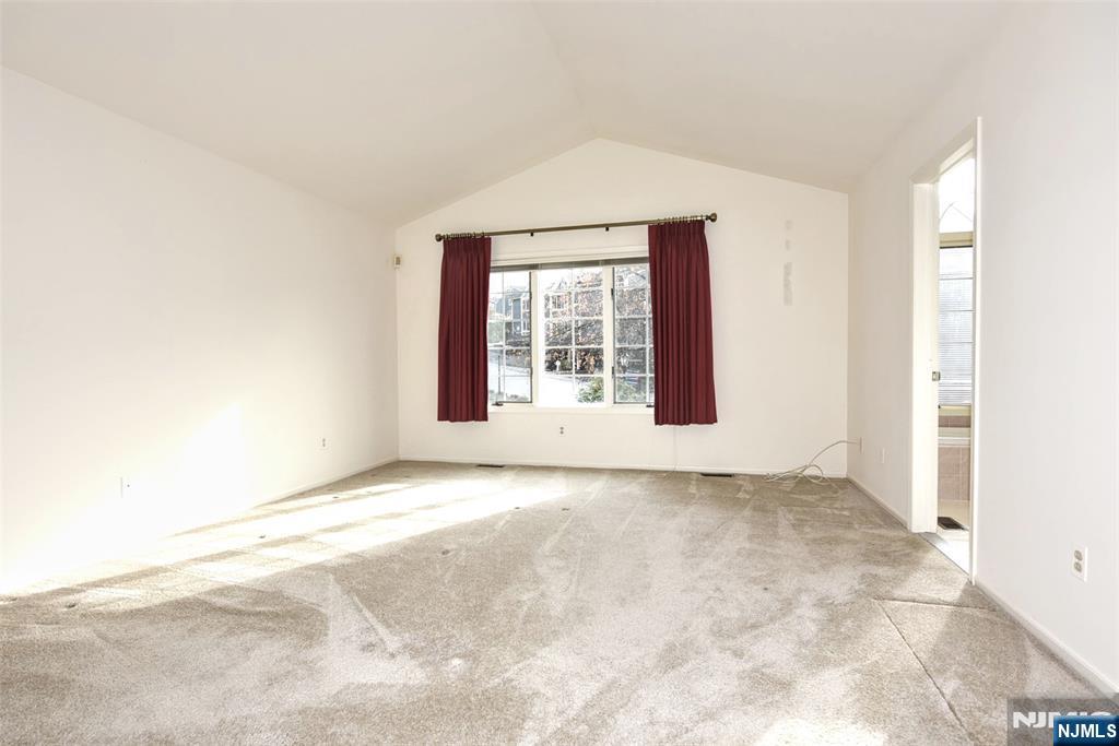 339 Cambridge Drive Ramsey, NJ 07446 - Photo 13 of 26 an empty room with windows