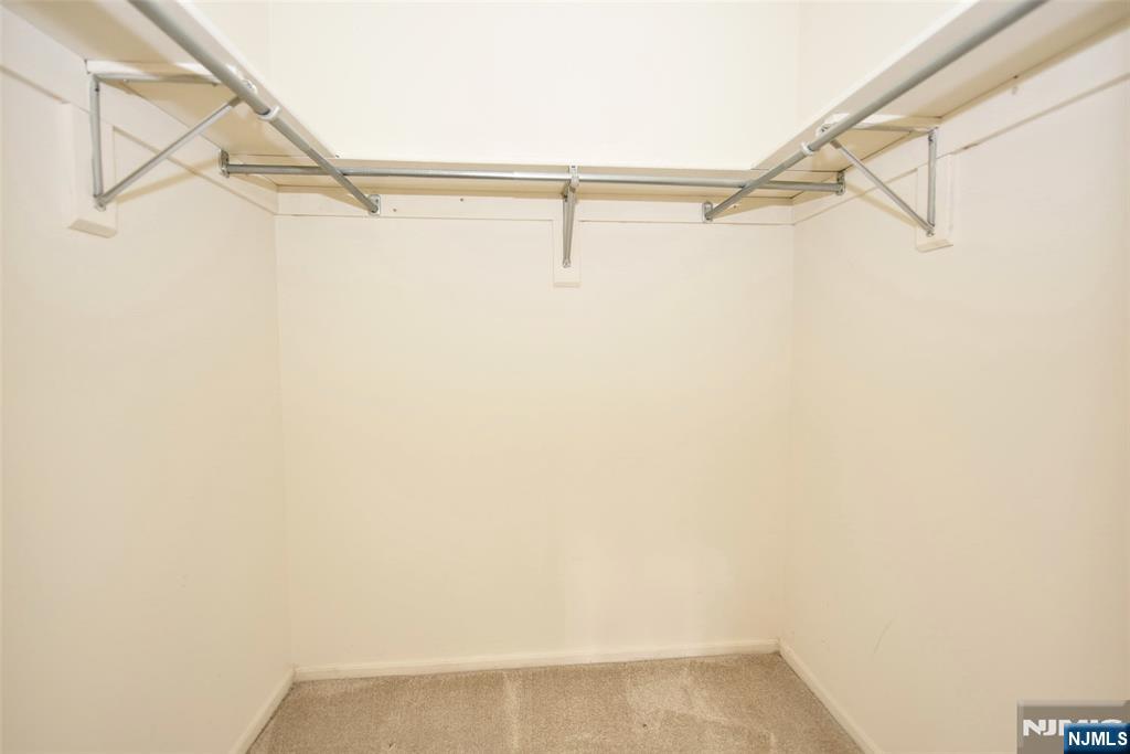 339 Cambridge Drive Ramsey, NJ 07446 - Photo 16 of 26 a view of small space with racks on the wall