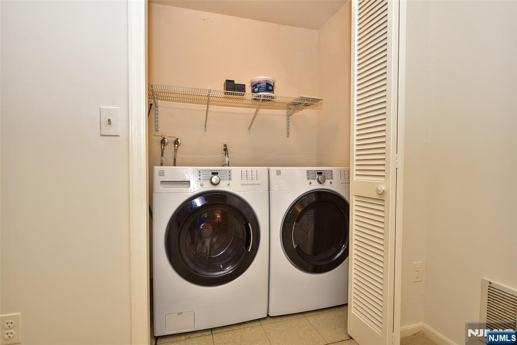 339 Cambridge Drive Ramsey, NJ 07446 - Photo 22 of 26 a utility room with dryer and washer