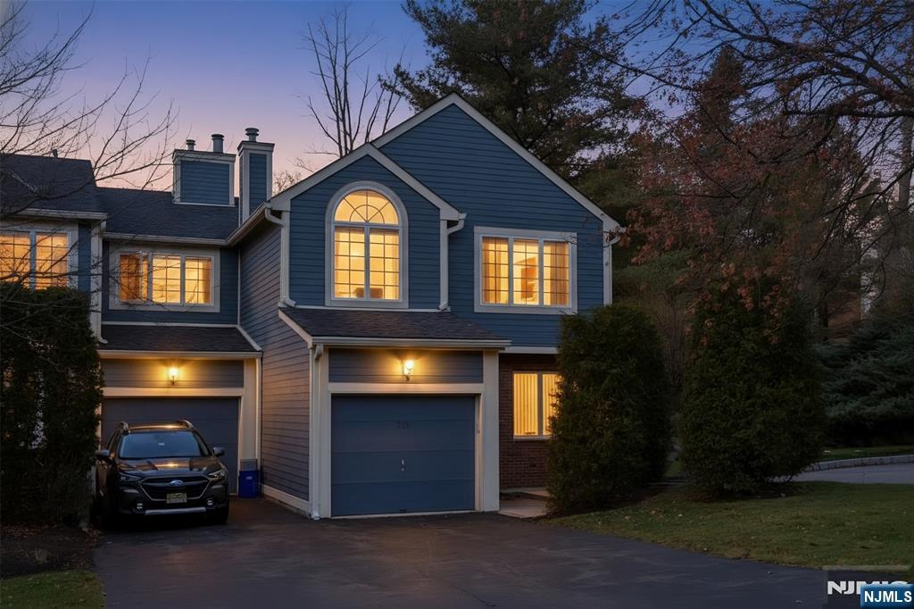 339 Cambridge Drive Ramsey, NJ 07446 - Photo 24 of 26 a view of a car park in front of house