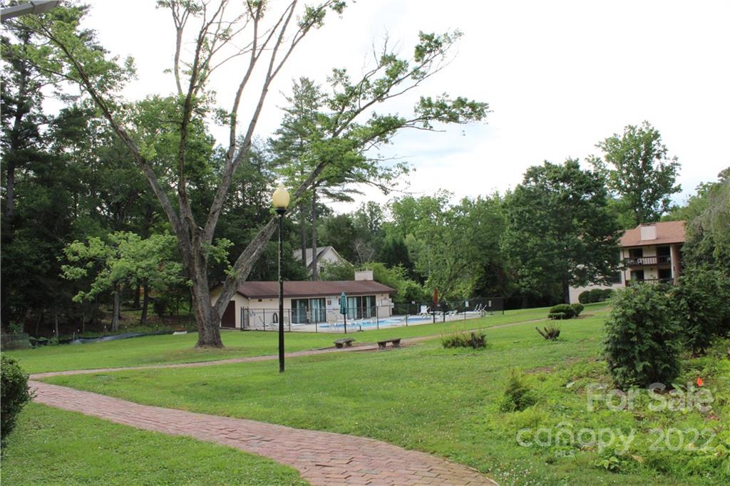 71 Shepard Square Brevard, NC 28712 - Photo 22 of 23 a front view of a house with a yard