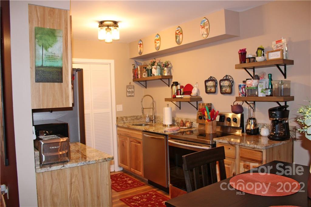 71 Shepard Square Brevard, NC 28712 - Photo 5 of 23 a kitchen with lots of counter top space and a sink