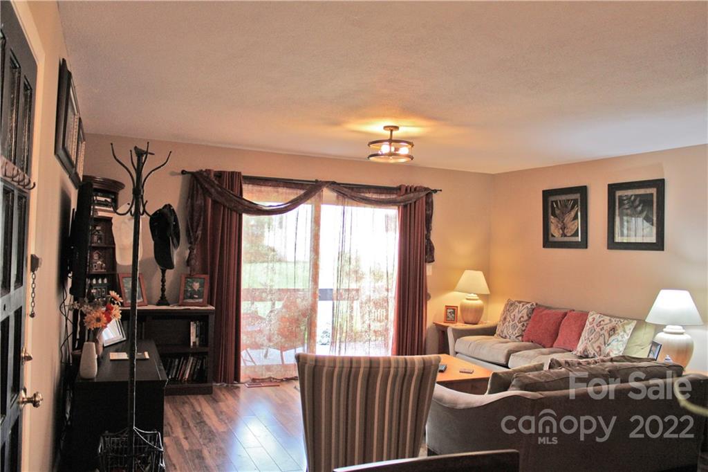 71 Shepard Square Brevard, NC 28712 - Photo 10 of 23 a living room with furniture and a window