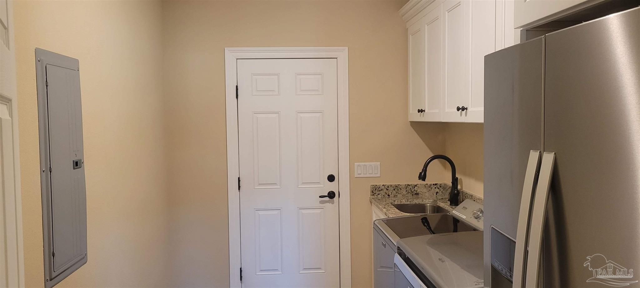 7381 Old Bay Pointe Road Milton, FL 32583 - Photo 8 of 8 a close view of a sink and a mirror in a bathroom