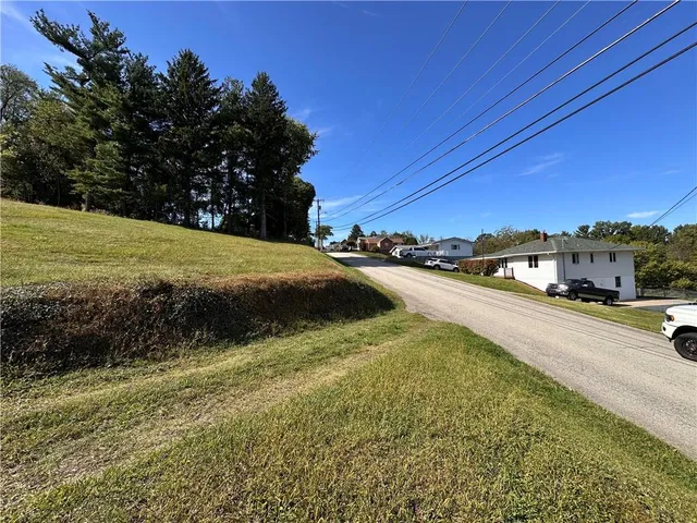 a view of a swimming pool and an outdoor space