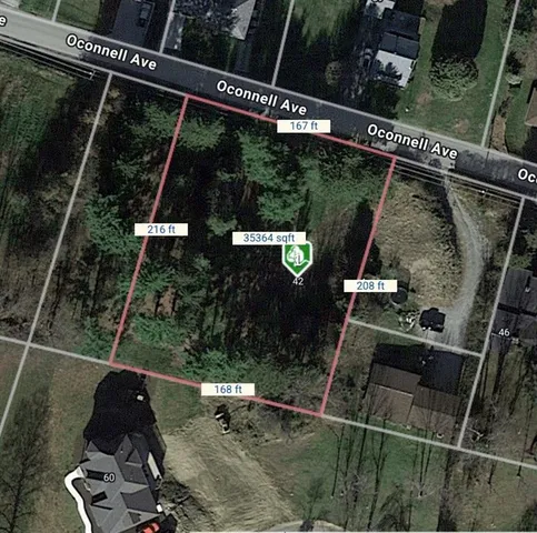 a view of roof deck with wooden floor and outdoor seating