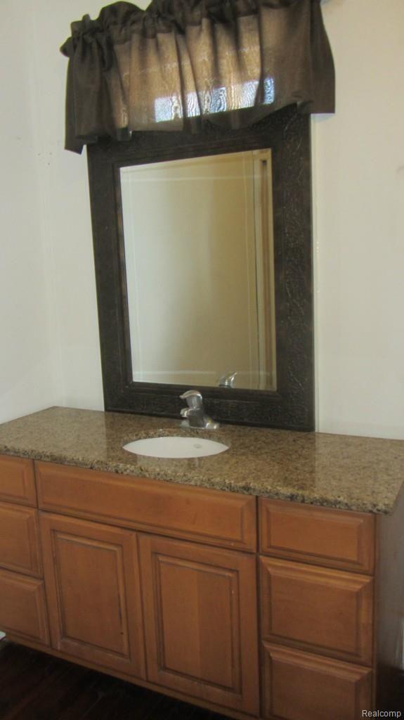 7395 Buckell Lake Road Holly, MI 48442 - Photo 13 of 32 Master bath w/ Granite