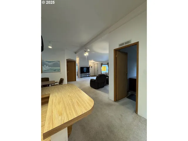 a view of a living room with furniture