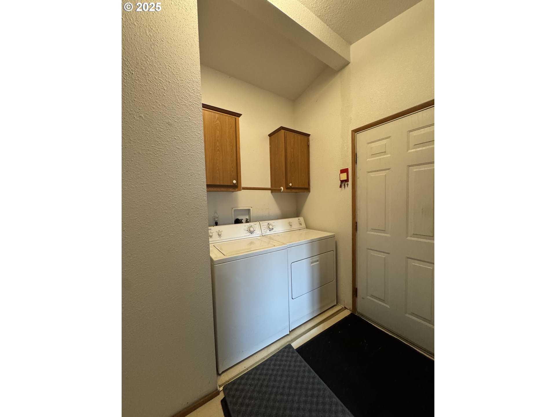 15619 Northeast Caples Road, Unit 72 Brush Prairie, WA 98606 - Photo 17 of 24 a bathroom with a sink and a mirror