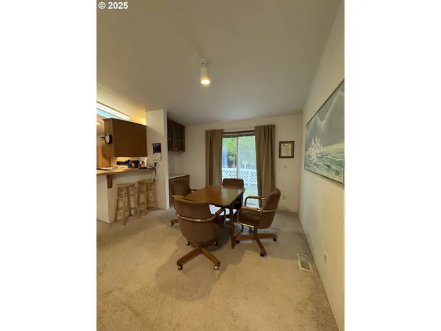 a workspace with furniture and a window