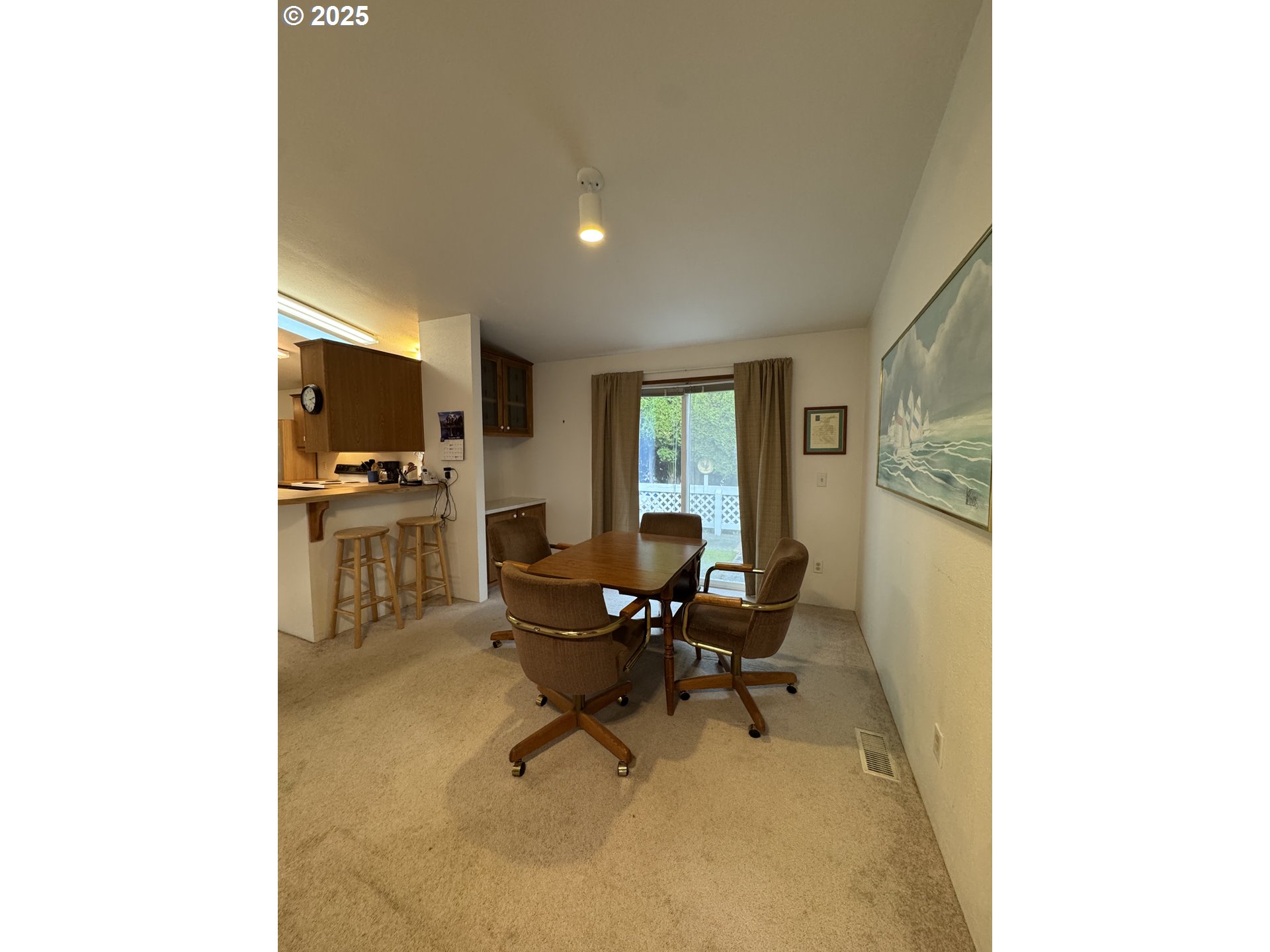 15619 Northeast Caples Road, Unit 72 Brush Prairie, WA 98606 - Photo 10 of 24 a workspace with furniture and a window