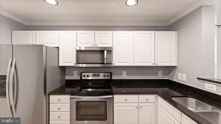 1918 Crescent Park Drive Reston, VA 20190 - Photo 9 of 33 Sleek modern kitchen with elegance.
