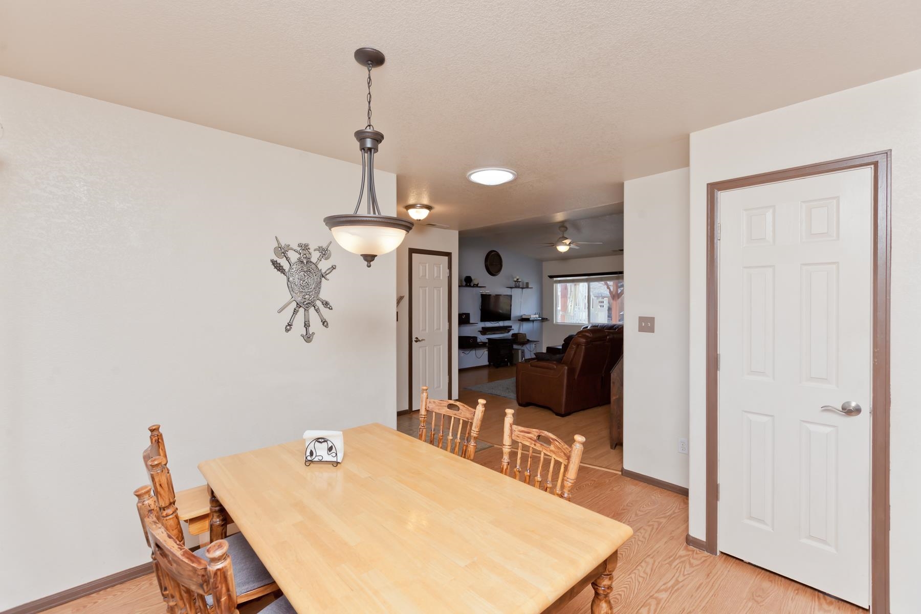231 Narrow Leaf Drive Fruita, CO 81521 - Photo 18 of 40 a view of a dining room with furniture