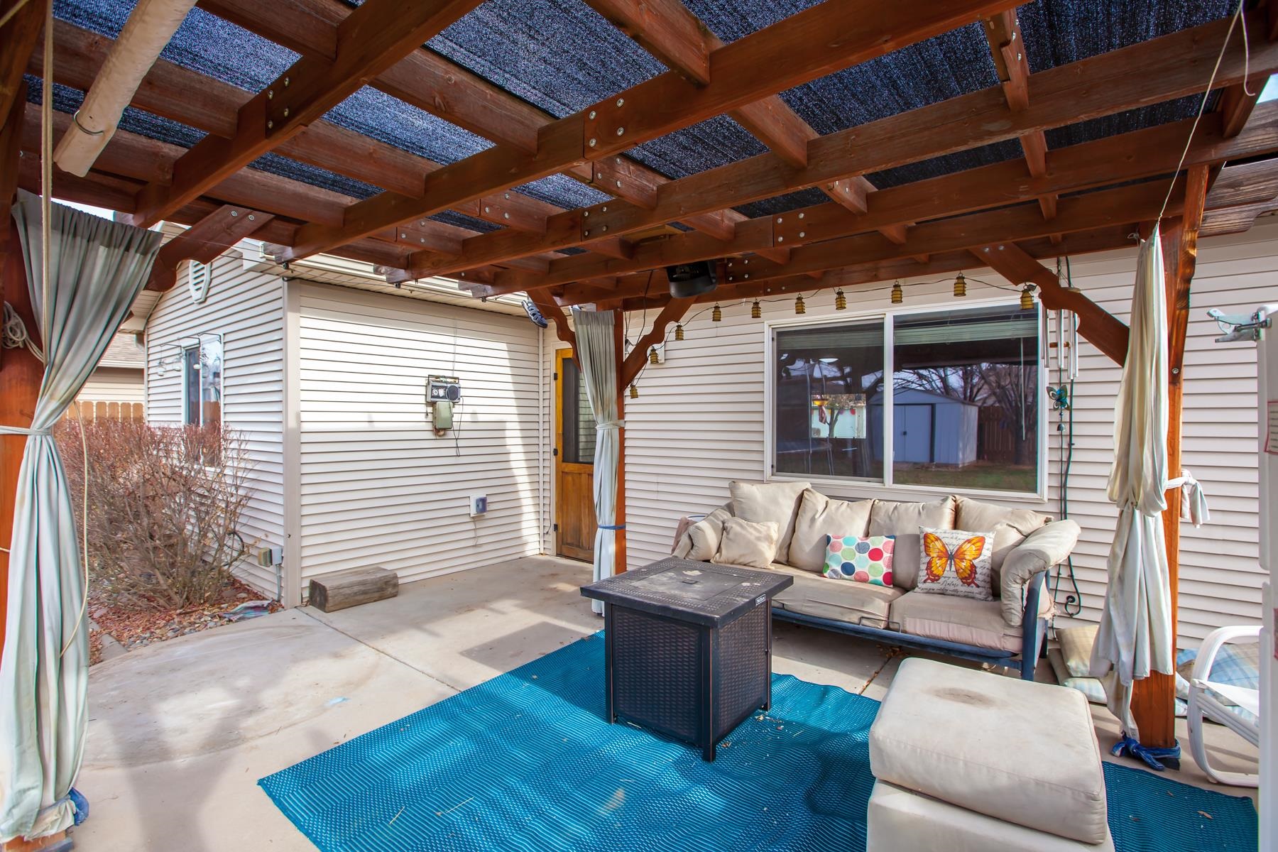 231 Narrow Leaf Drive Fruita, CO 81521 - Photo 28 of 40 a outdoor living space with furniture and a couch