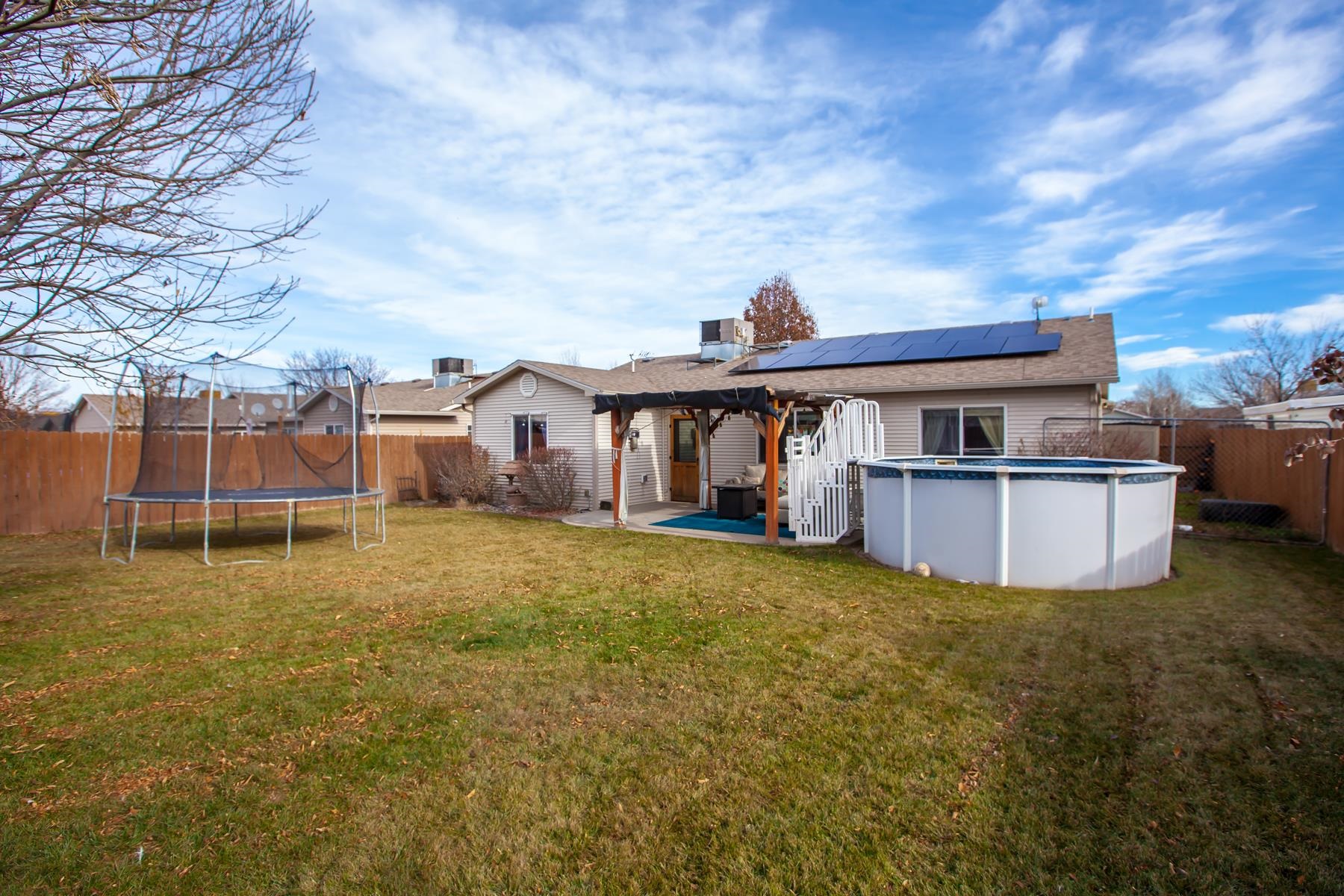 231 Narrow Leaf Drive Fruita, CO 81521 - Photo 37 of 40 a view of a house with a backyard