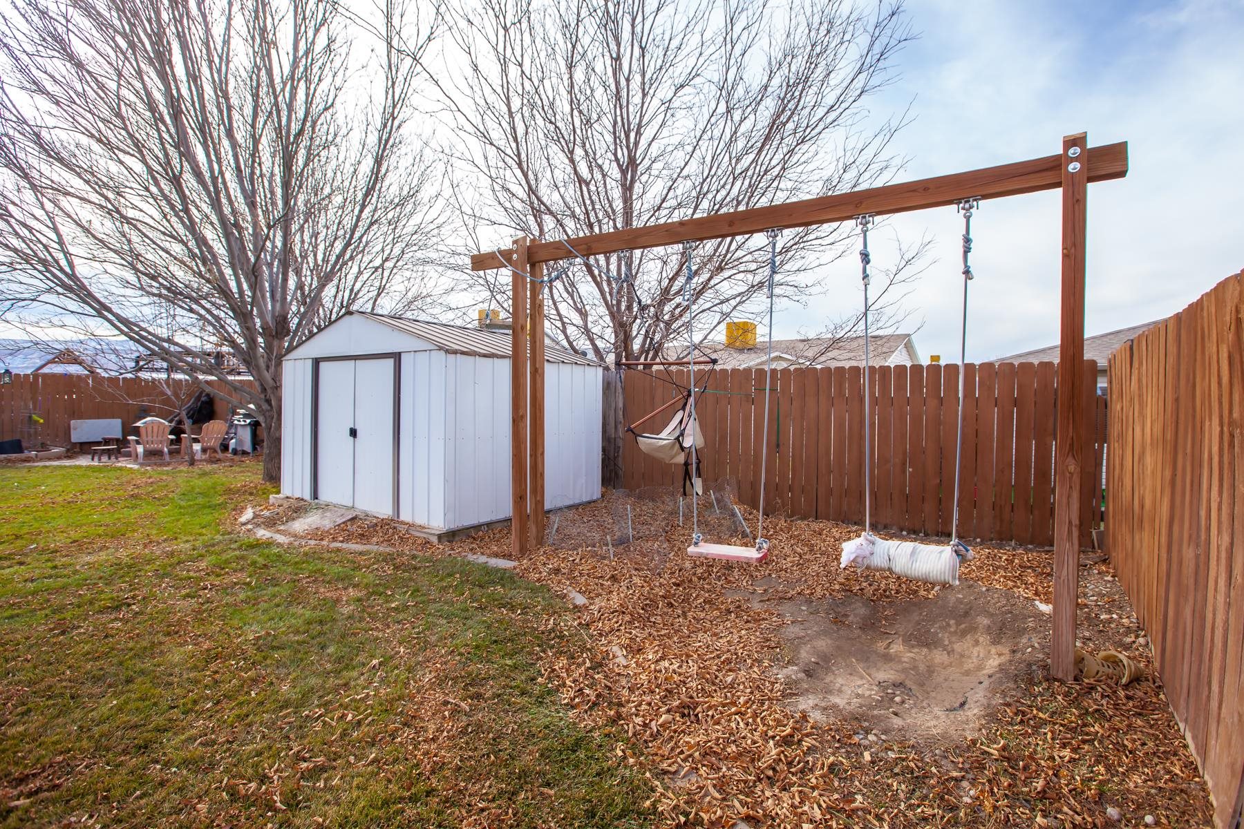 231 Narrow Leaf Drive Fruita, CO 81521 - Photo 39 of 40 a backyard of a house with lots of green space
