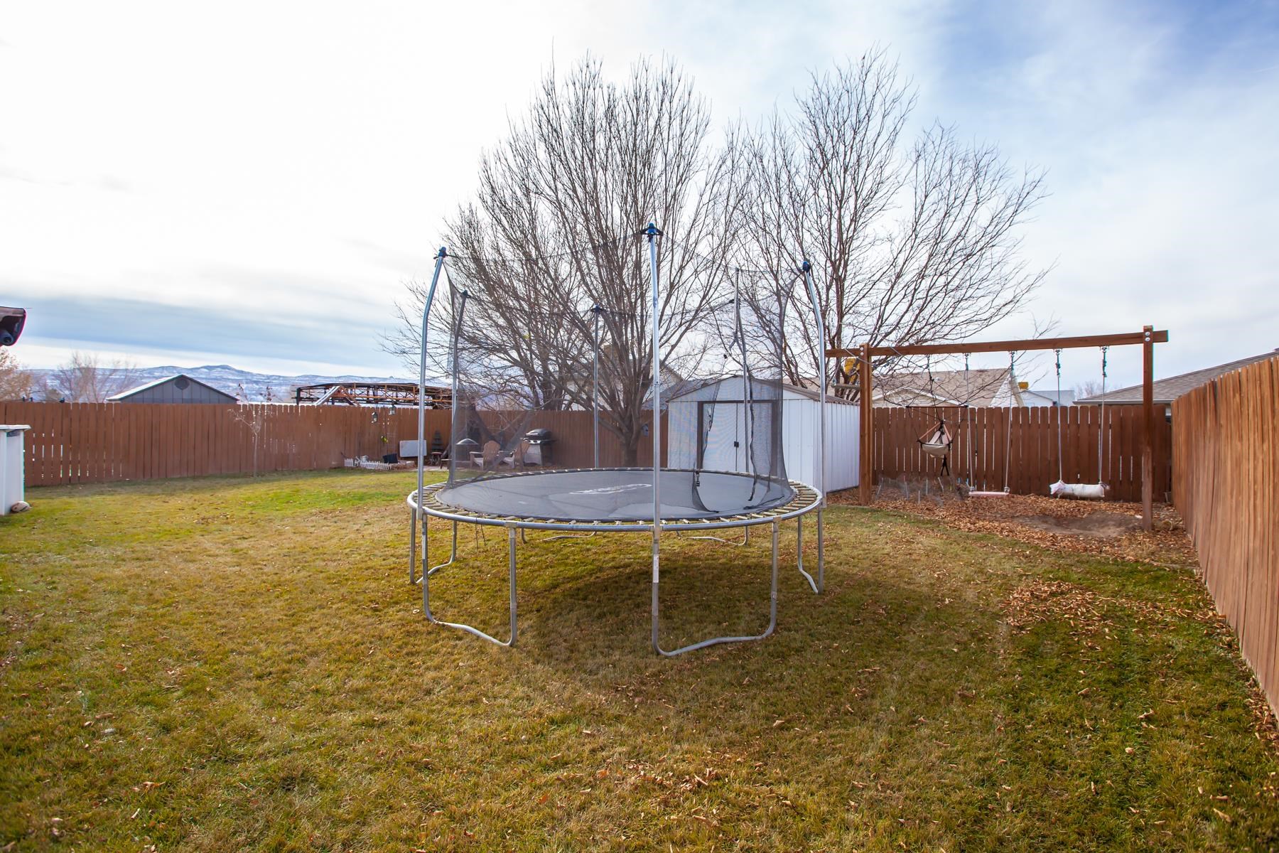 231 Narrow Leaf Drive Fruita, CO 81521 - Photo 40 of 40 a view of a backyard with swimming pool