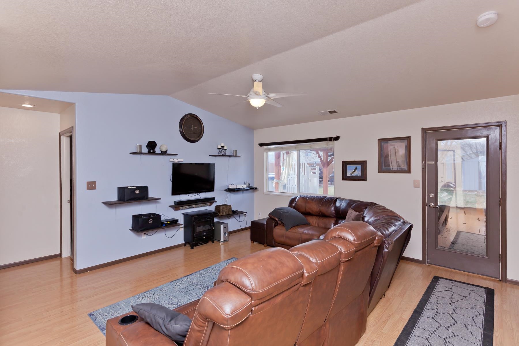 231 Narrow Leaf Drive Fruita, CO 81521 - Photo 4 of 40 a living room with furniture and a wooden floor
