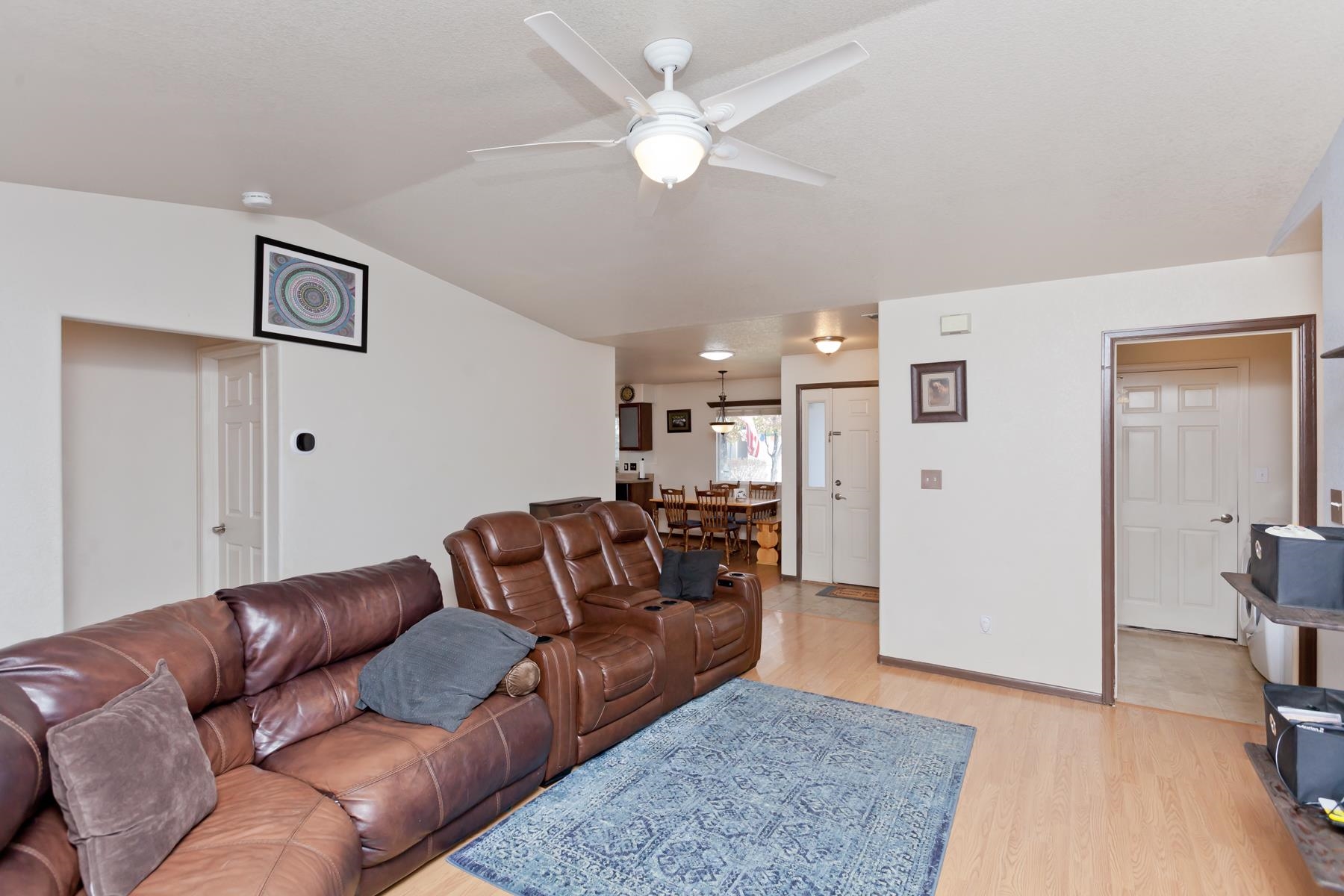 231 Narrow Leaf Drive Fruita, CO 81521 - Photo 6 of 40 a living room with furniture and a rug