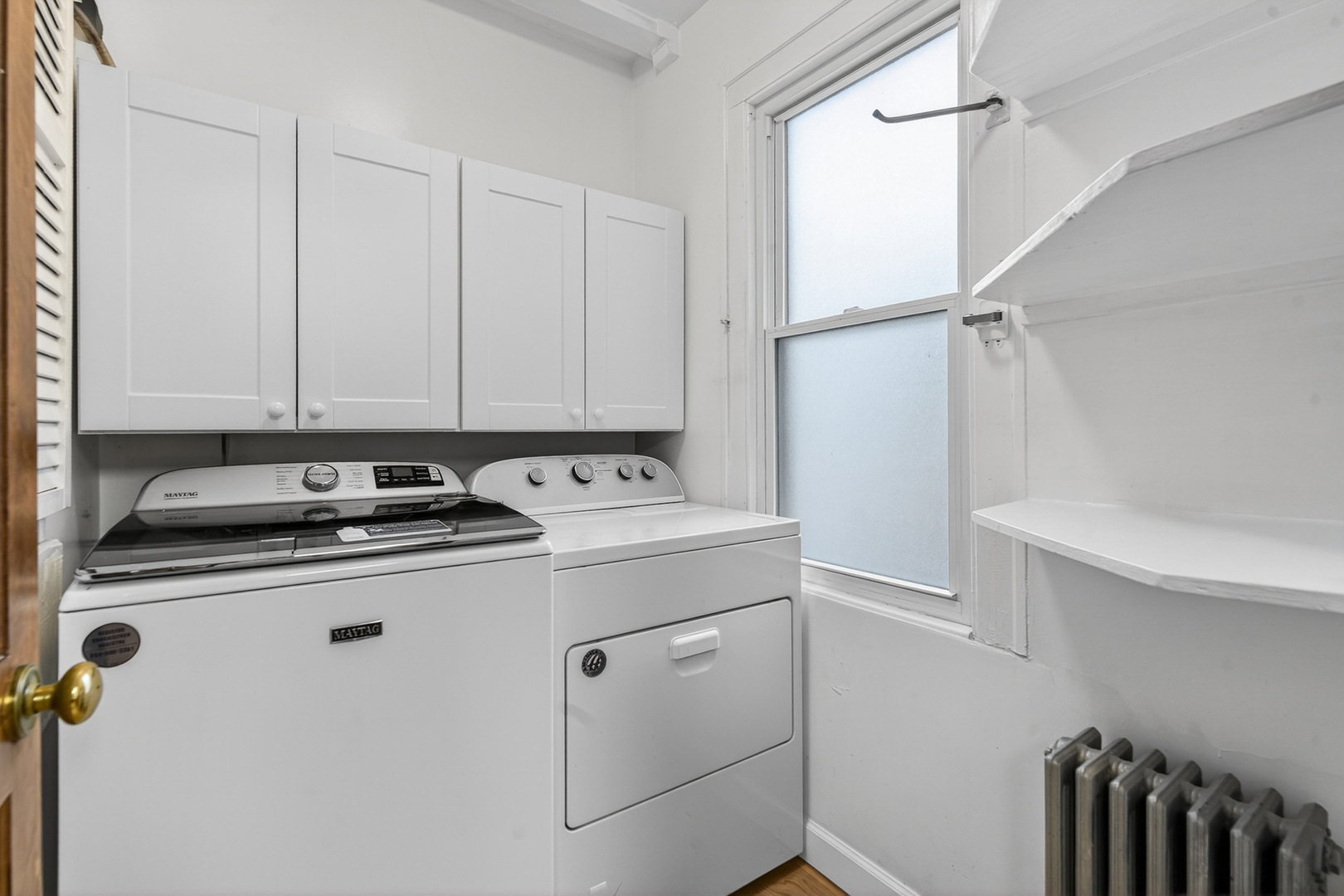 1820 South Prospect Avenue Park Ridge, IL 60068 - Photo 15 of 33 a view of a storage and utility room with washer and dryer