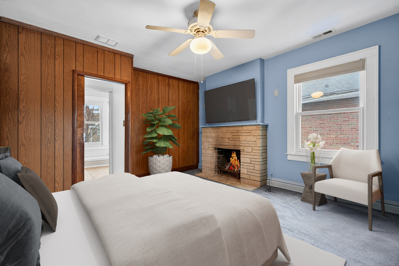 1820 South Prospect Avenue Park Ridge, IL 60068 - Photo 18 of 33 a spacious bedroom with a bed and a fireplace