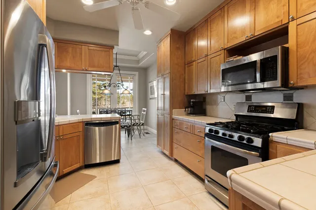 a kitchen with a stove and a microwave