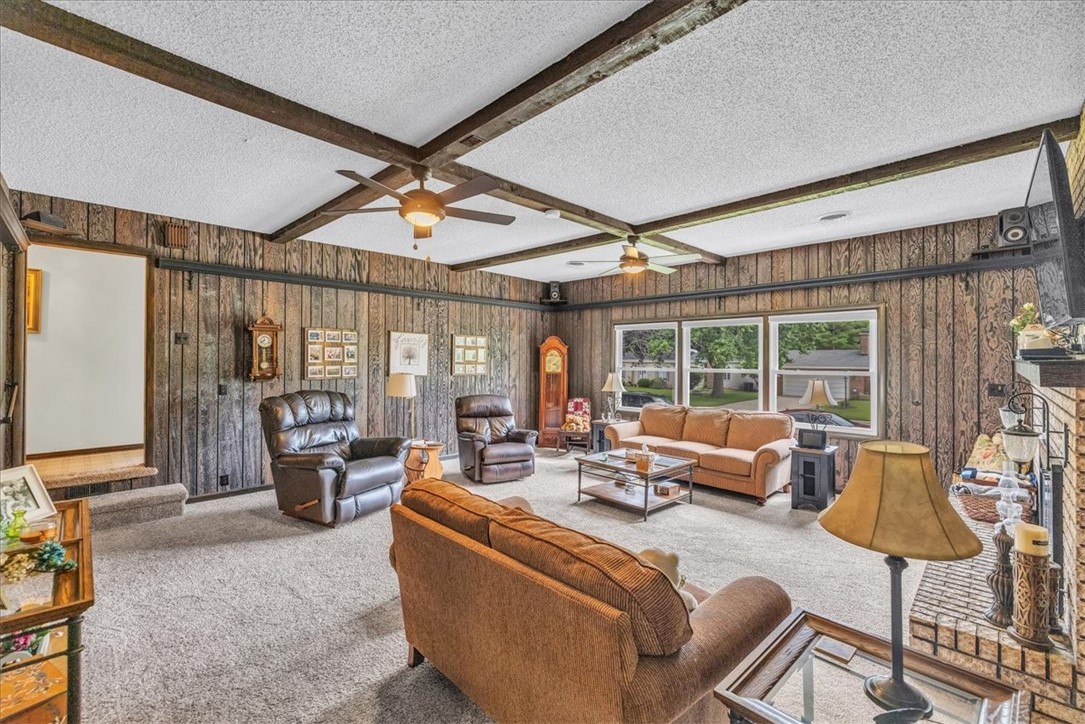 2220 West Ravina Park Road Decatur, IL 62526 - Photo 14 of 36 a living room with furniture and a large window