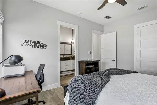 a bedroom with furniture and a bed