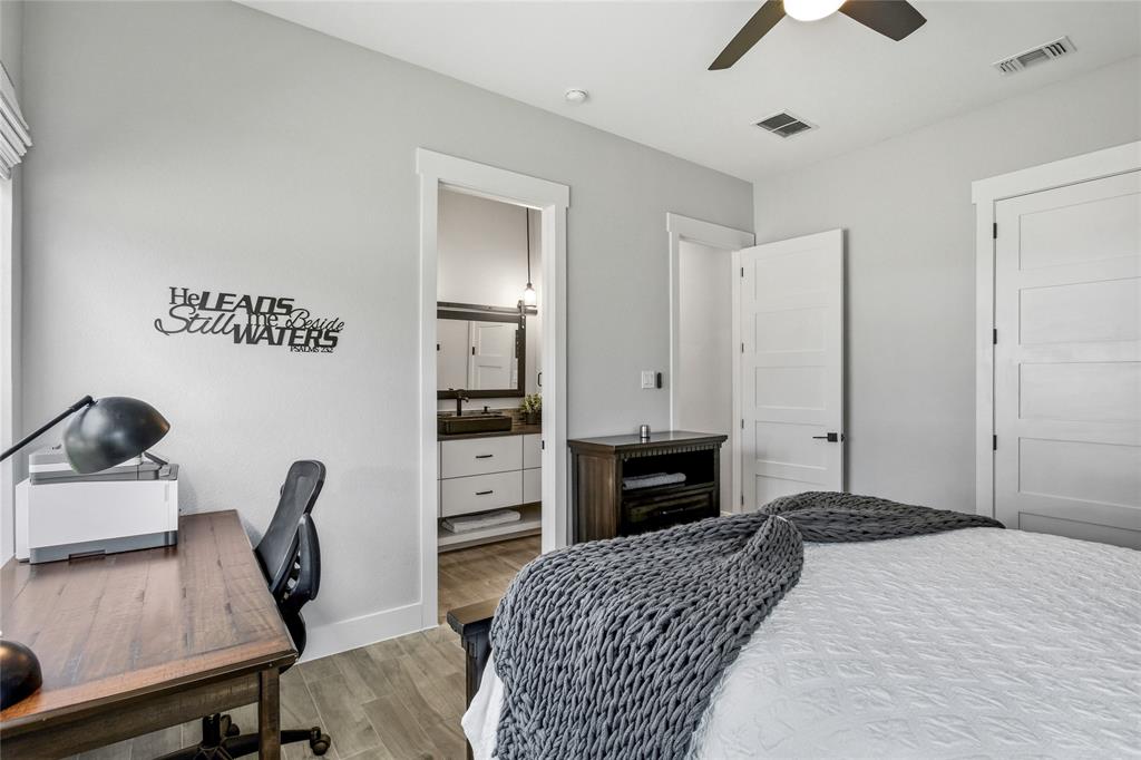 216 Glen Ellen Road Pottsboro, TX 75076 - Photo 25 of 38 a bedroom with furniture and a bed