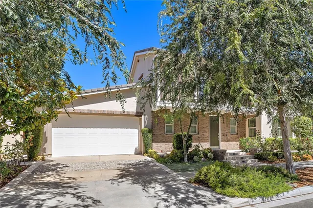 a view of a house with a street