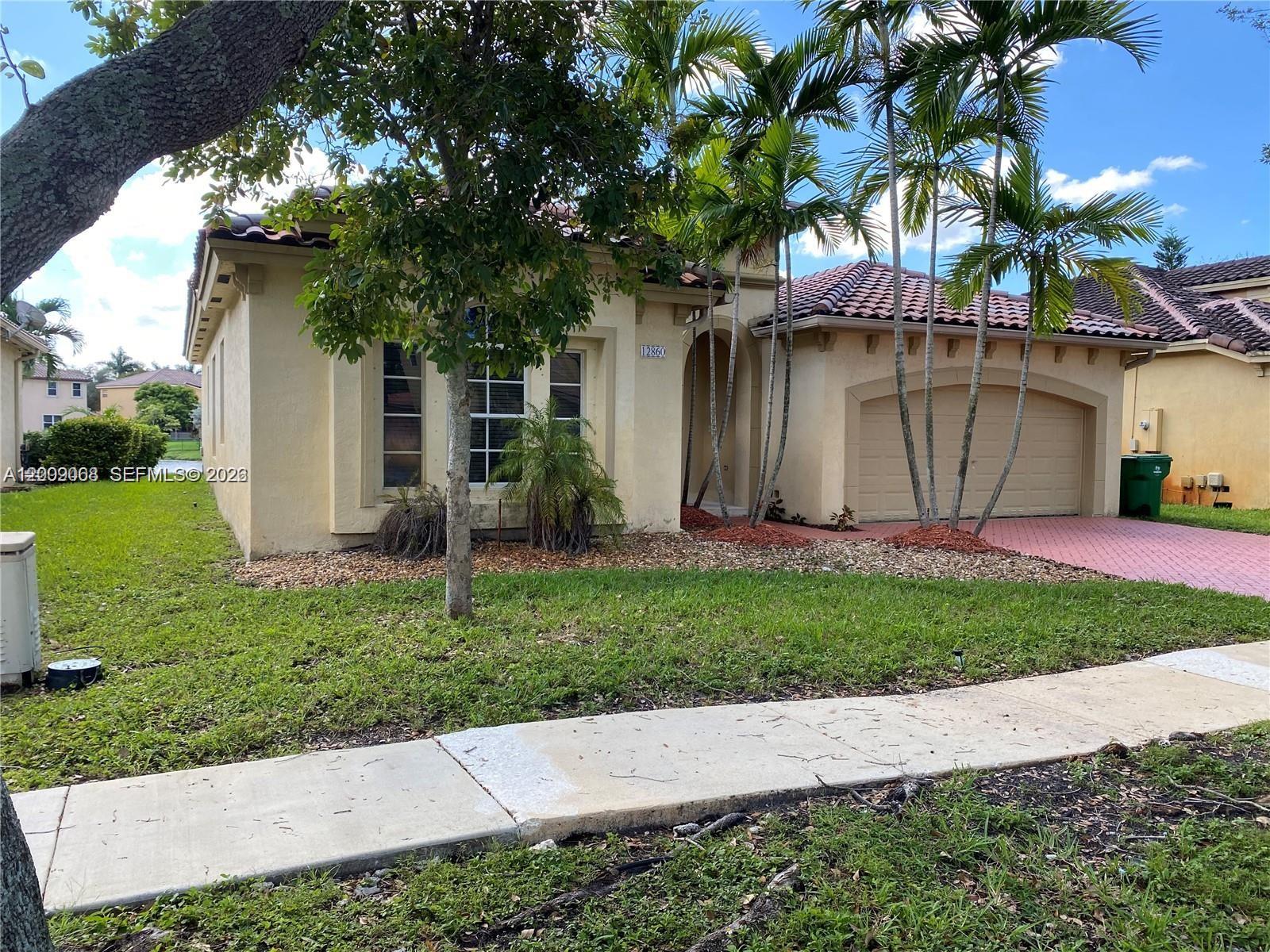 12860 Southwest 51st Street Miramar, FL 33027 - Photo 28 of 29 a view of a back yard