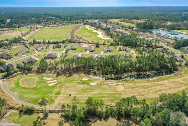 a view of a swimming pool with a lake view