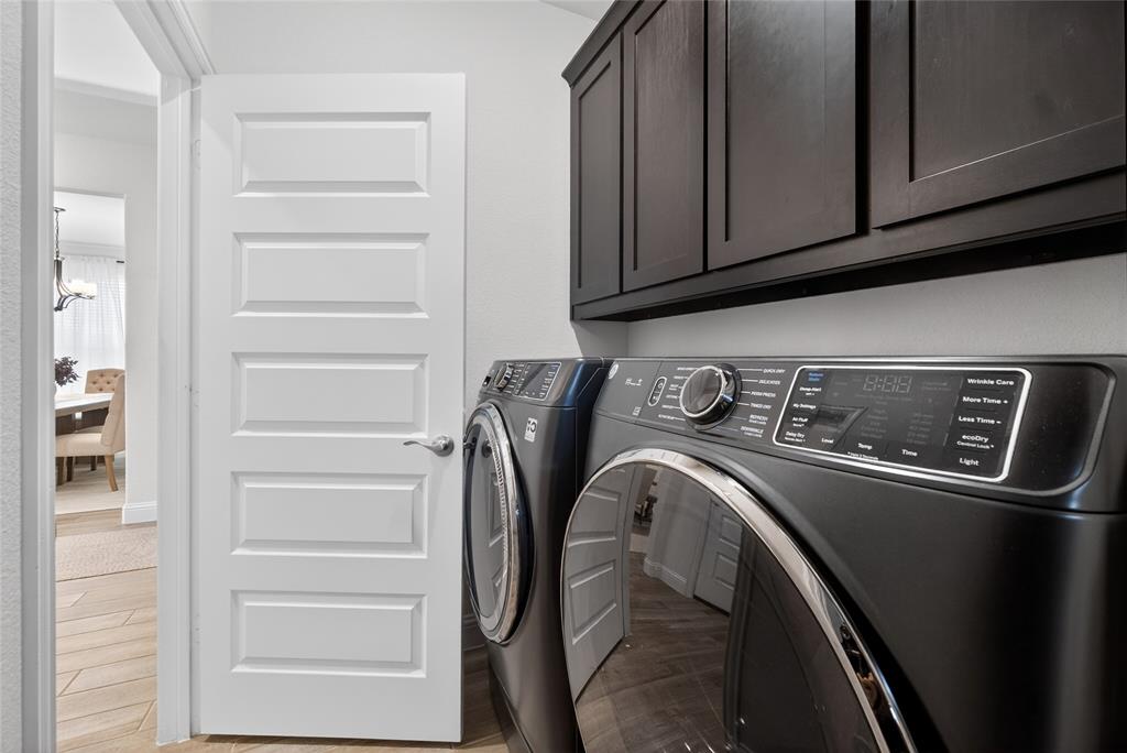 596 Randys Way Pilot Point, TX 76258 - Photo 25 of 40 a utility room with washer and dryer