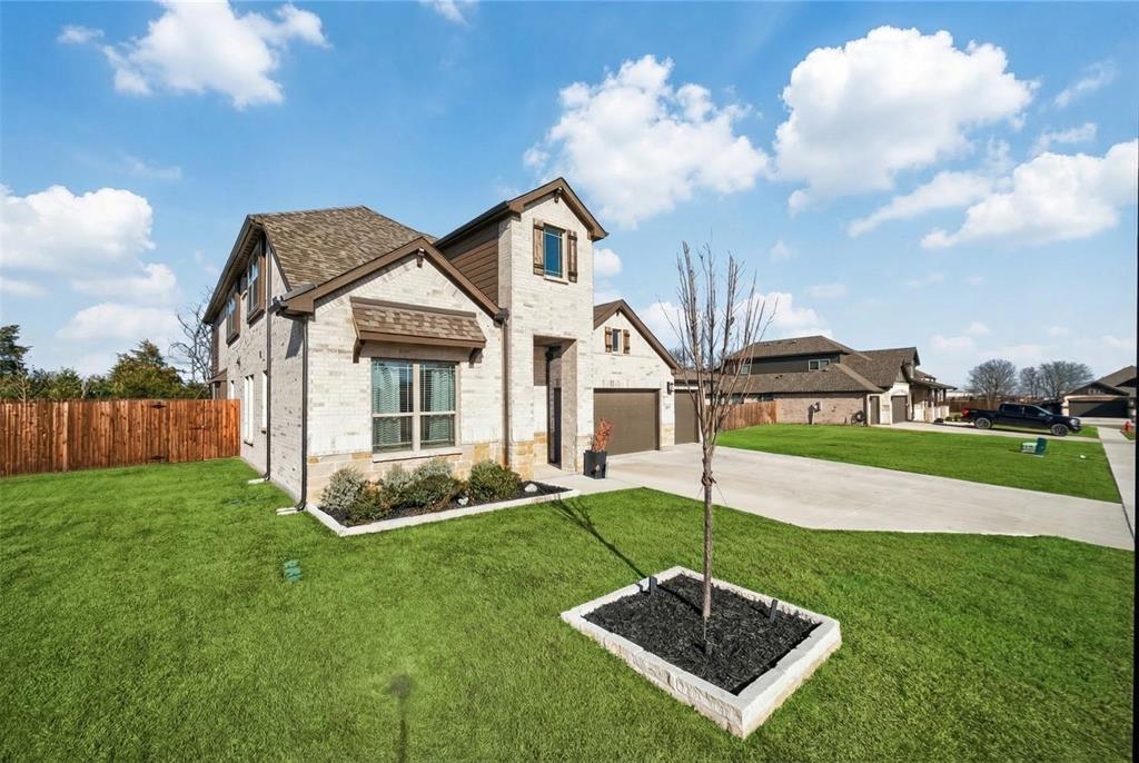 596 Randys Way Pilot Point, TX 76258 - Photo 3 of 40 a front view of a house with a yard