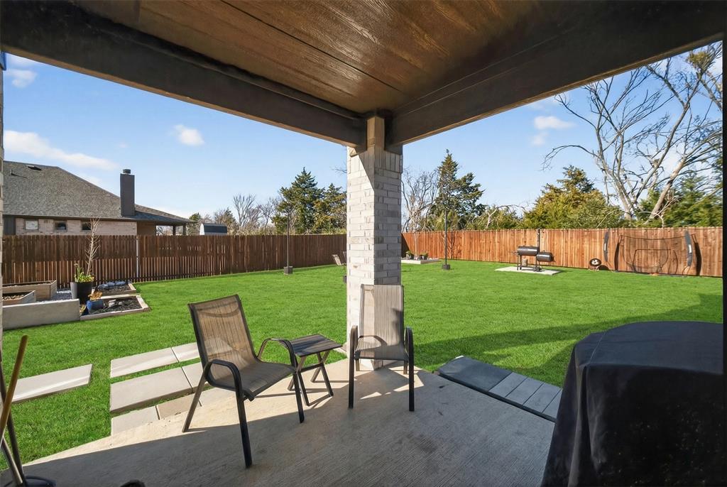 596 Randys Way Pilot Point, TX 76258 - Photo 34 of 40 a view of yard with seating area and furniture