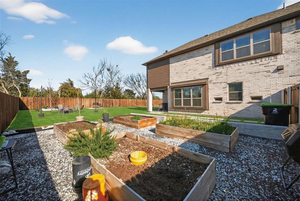596 Randys Way Pilot Point, TX 76258 - Photo 35 of 40 a view of a house with backyard porch and sitting area