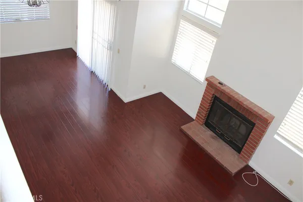 a bathroom with a granite countertop sink mirror and a bathtub