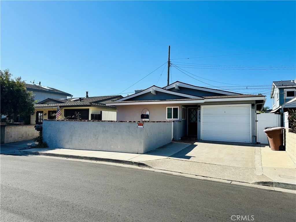 a front view of a house with a garage