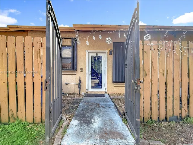 a view of a front door and porch of a house