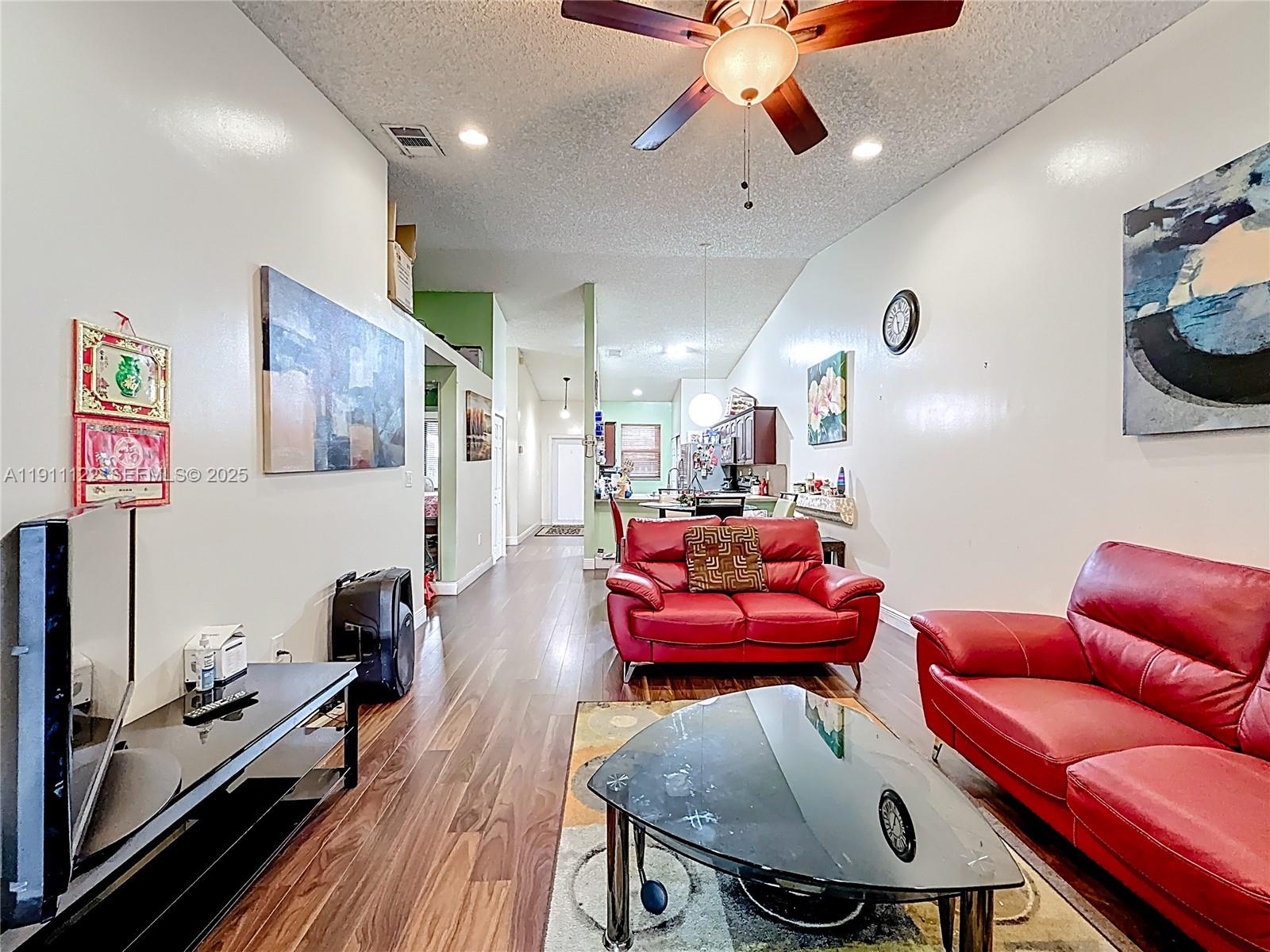 6722 Northwest 192nd Lane Hialeah, FL 33015 - Photo 20 of 46 a living room with furniture