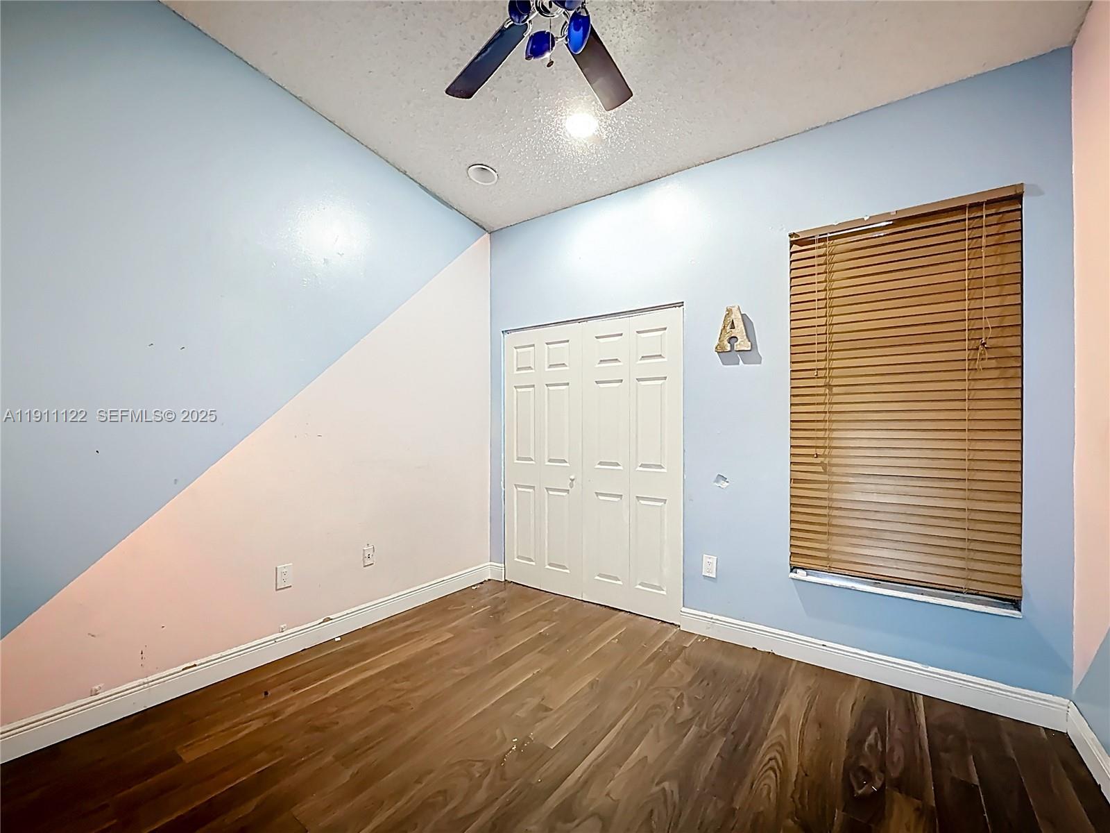 6722 Northwest 192nd Lane Hialeah, FL 33015 - Photo 27 of 46 a view of a livingroom with an empty space