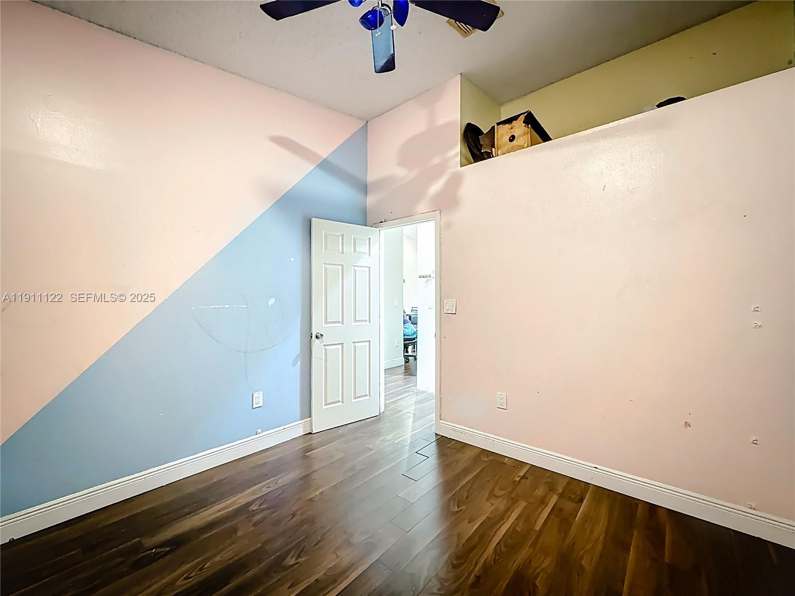 6722 Northwest 192nd Lane Hialeah, FL 33015 - Photo 29 of 46 a view of a room with wooden floor