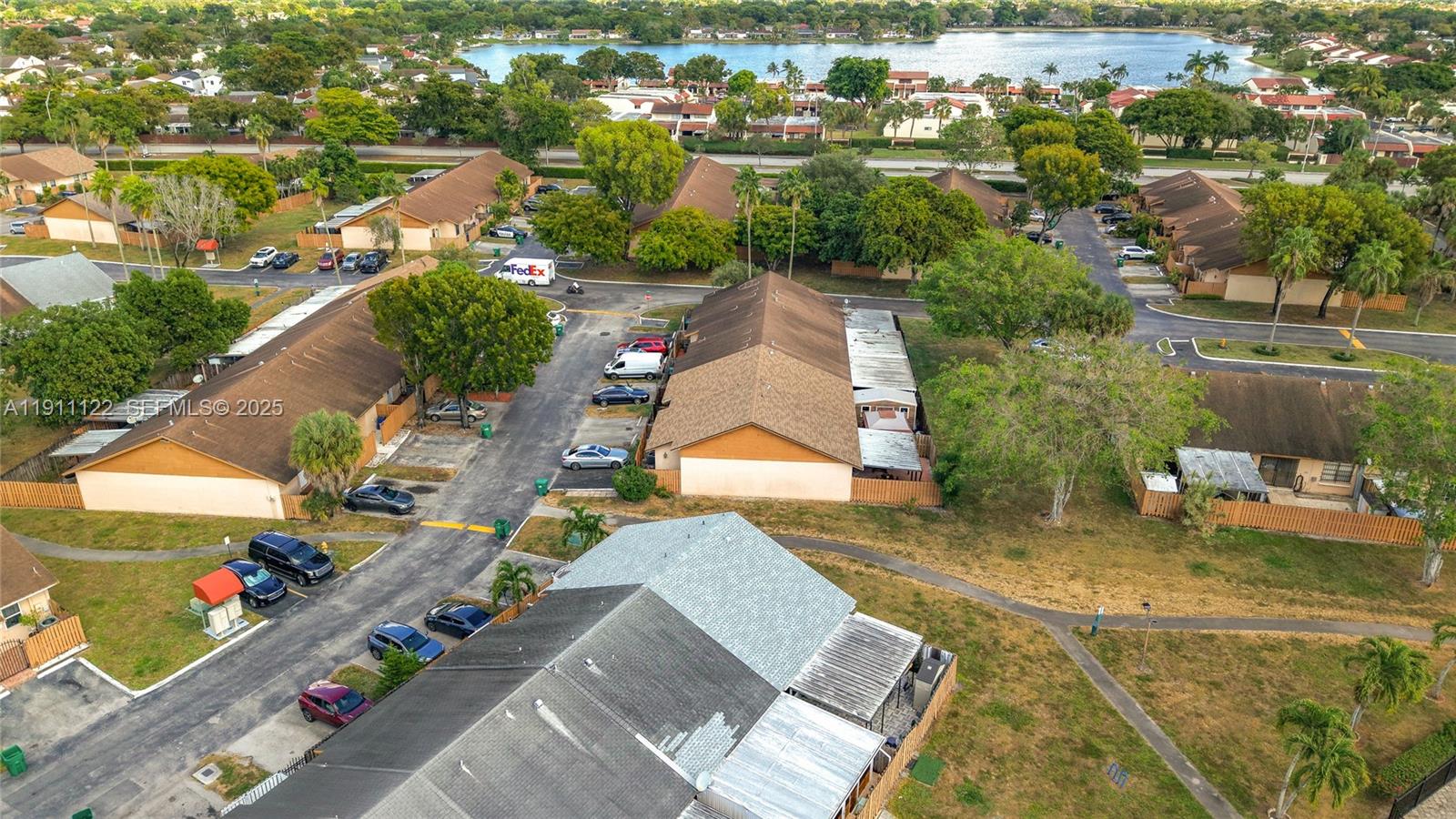 6722 Northwest 192nd Lane Hialeah, FL 33015 - Photo 36 of 46 an aerial view of a house with a yard basket ball court and outdoor seating