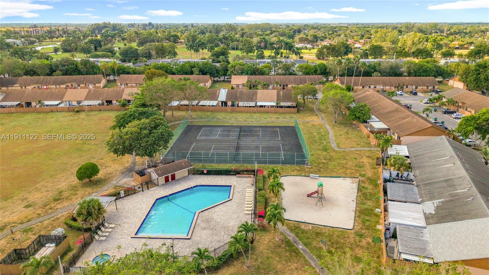 6722 Northwest 192nd Lane Hialeah, FL 33015 - Photo 44 of 46 an aerial view of a house with a ocean view